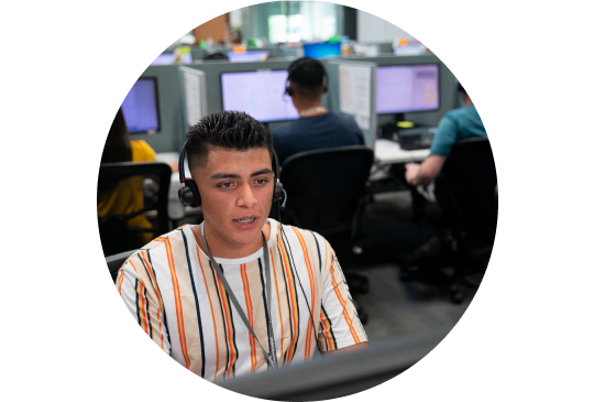 A Vivint customer service agent with headphone at a call center